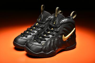 nike foamposite black and gold