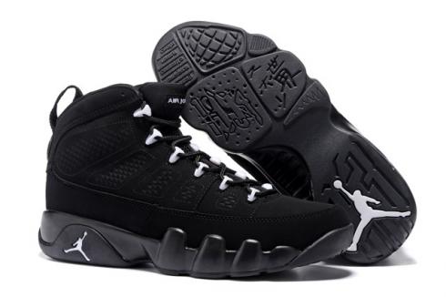 white and black jordan 9s