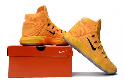 white and yellow nike basketball shoes