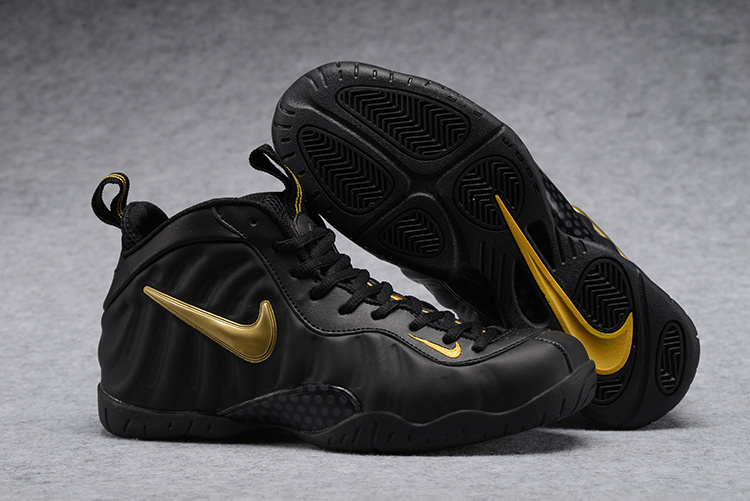 yellow and black nike foams