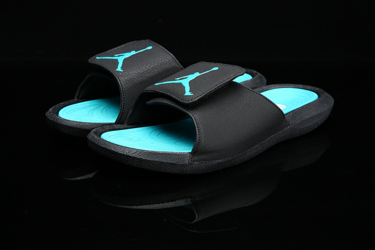 black and green nike slides