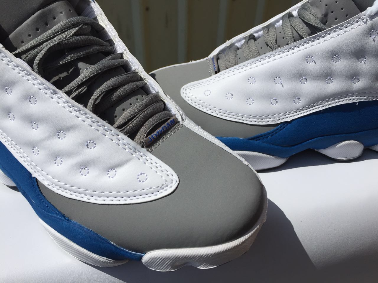 blue and white jordan basketball shoes
