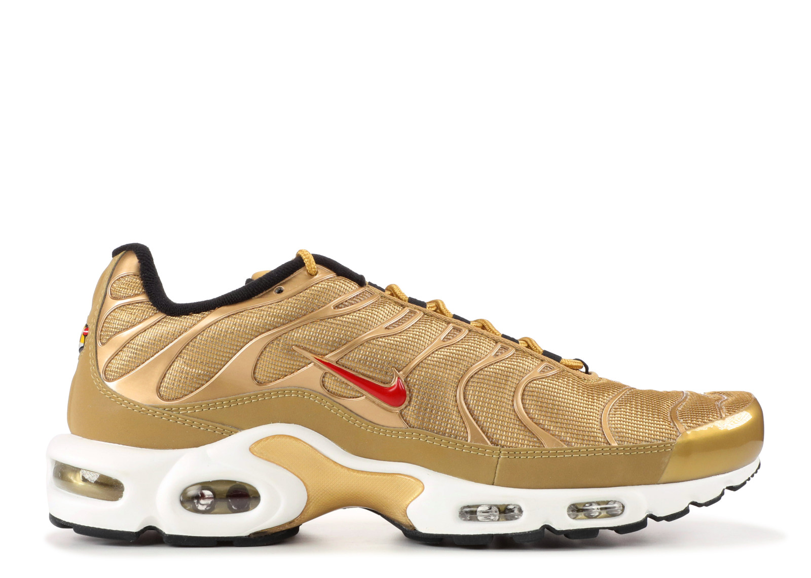 gold nike tn
