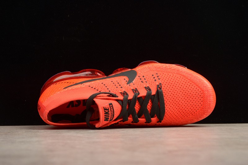 orange nike runners