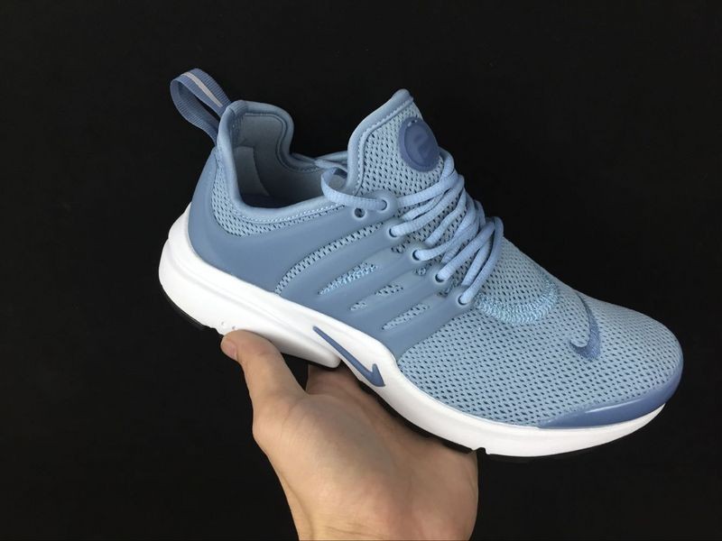 light blue nike runners