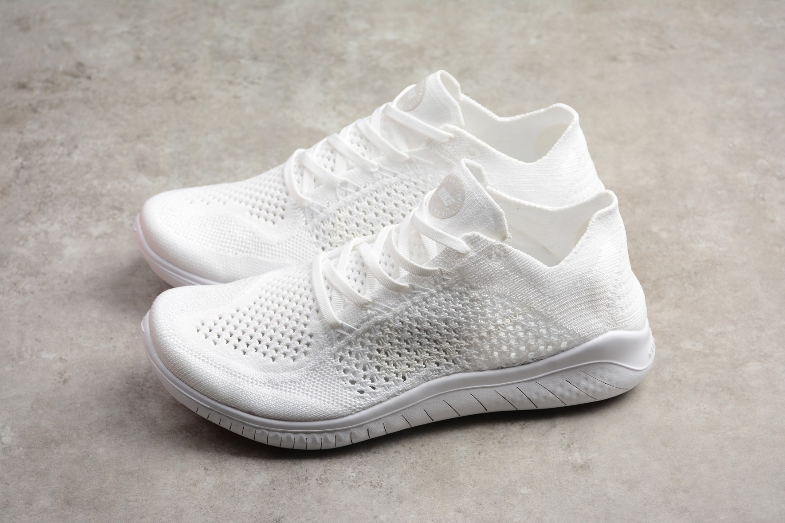 white nike free run flyknit