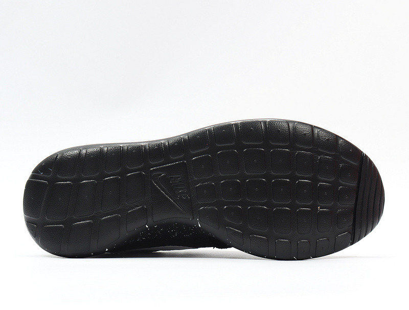 black nikes with white soles
