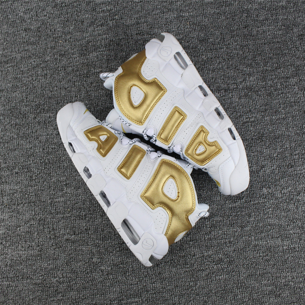 nike uptempo basketball player