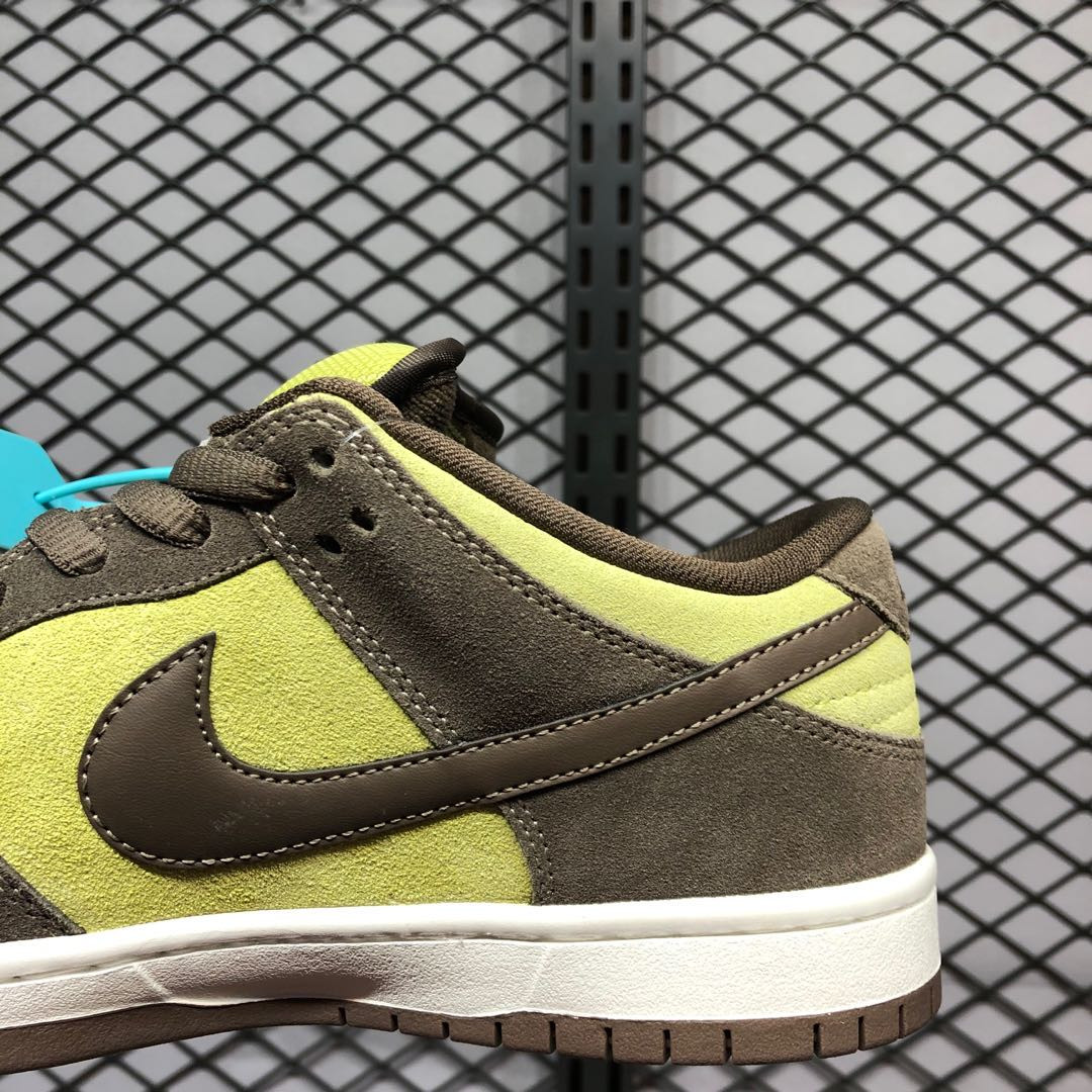 brown and yellow nike shoes