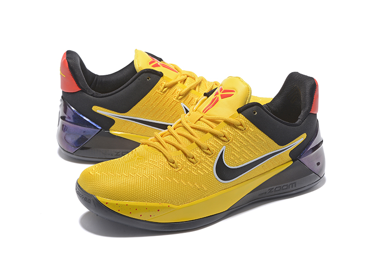 yellow and black nike cleats