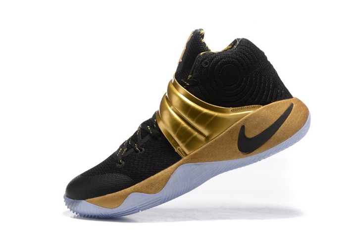 kyrie shoes black and gold
