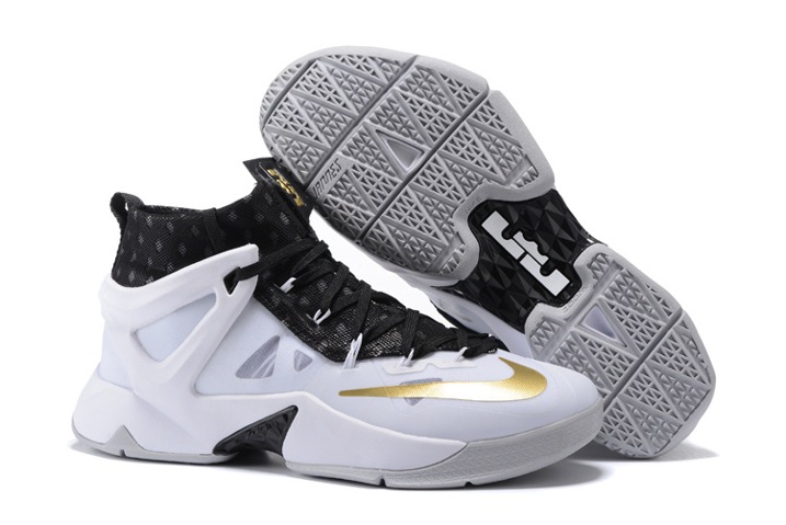 black gold and white basketball shoes